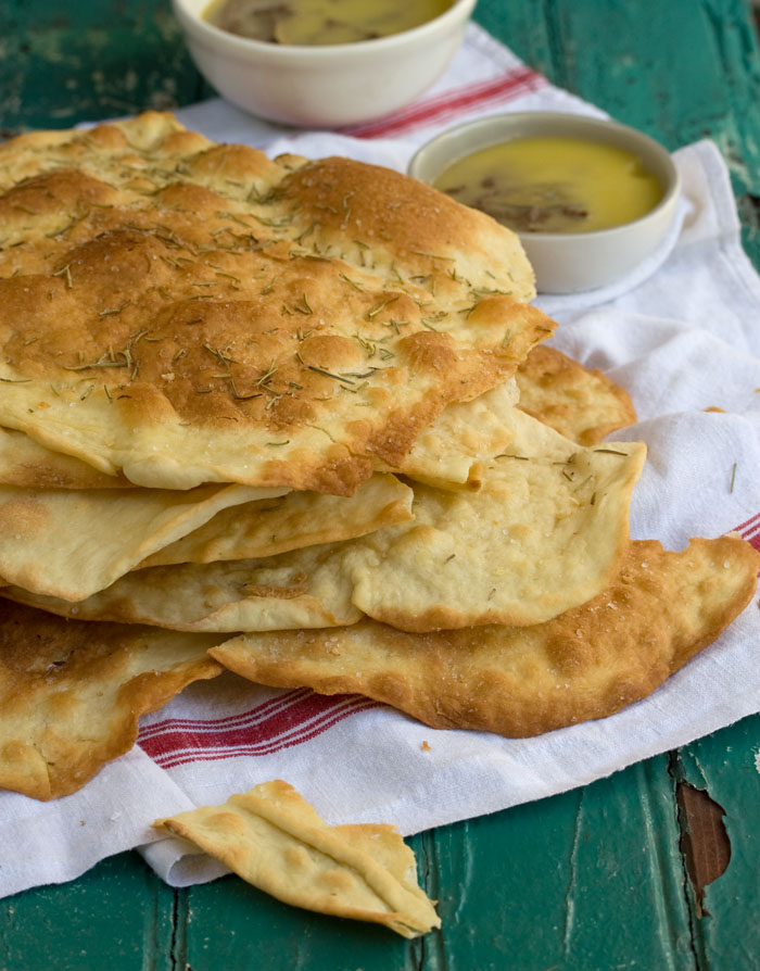 A pile of the best ever crispy flatbreads with salt and rosemary