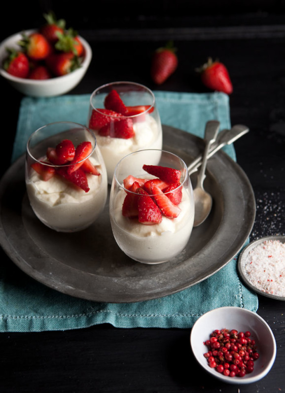 white chocolate mousse with strawberries and pink peppercorns