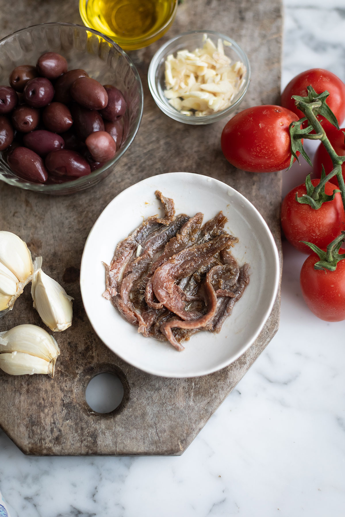 anchovies for spaghetti puttanesca sauce recipe • Drizzle and Dip A bowl of anchovies for spaghetti puttanesca sauce recipe