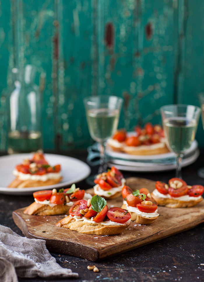 tomato and basil crostini with whipped goats cheese