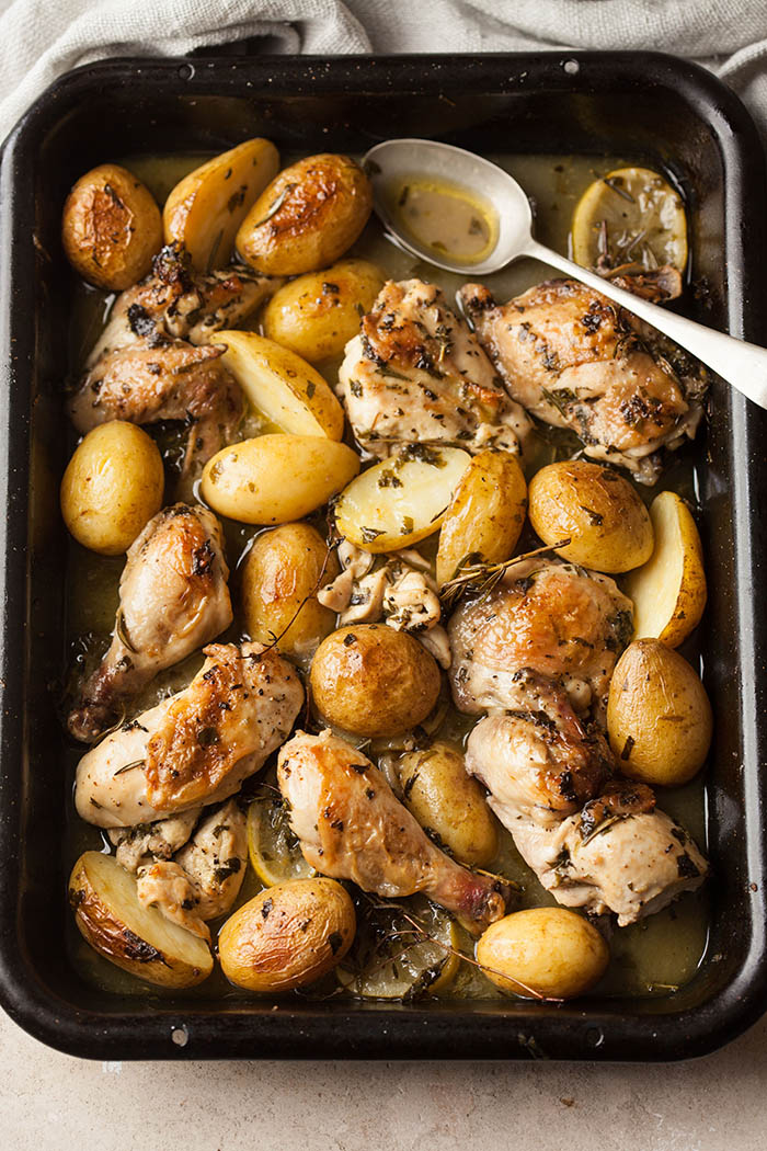 Roast chicken in white wine, herbs, garlic & potatoes