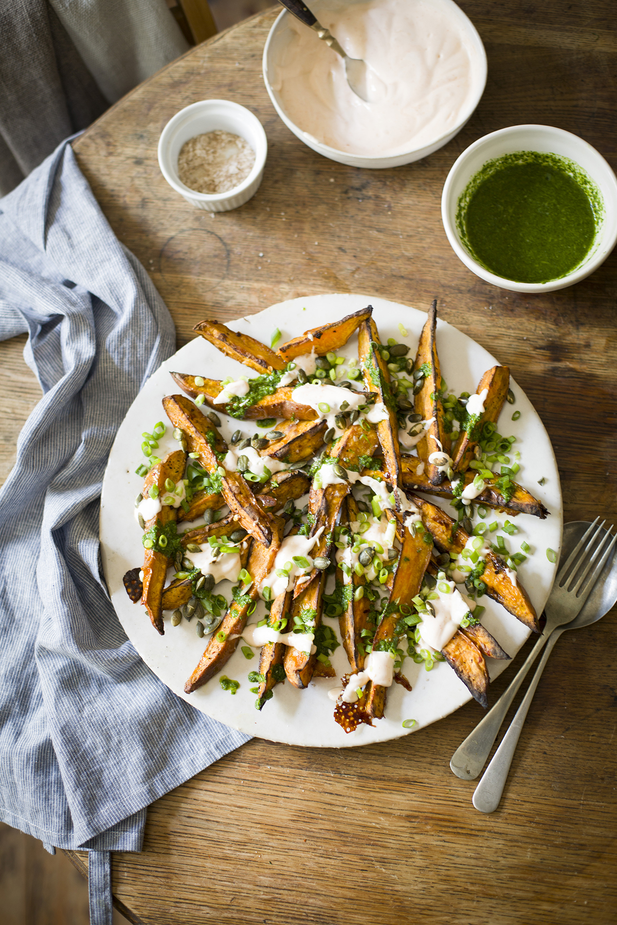 Roast sweet potato wedges with coriander dressing & spicy lime yoghurt | DrizzleandDip.com