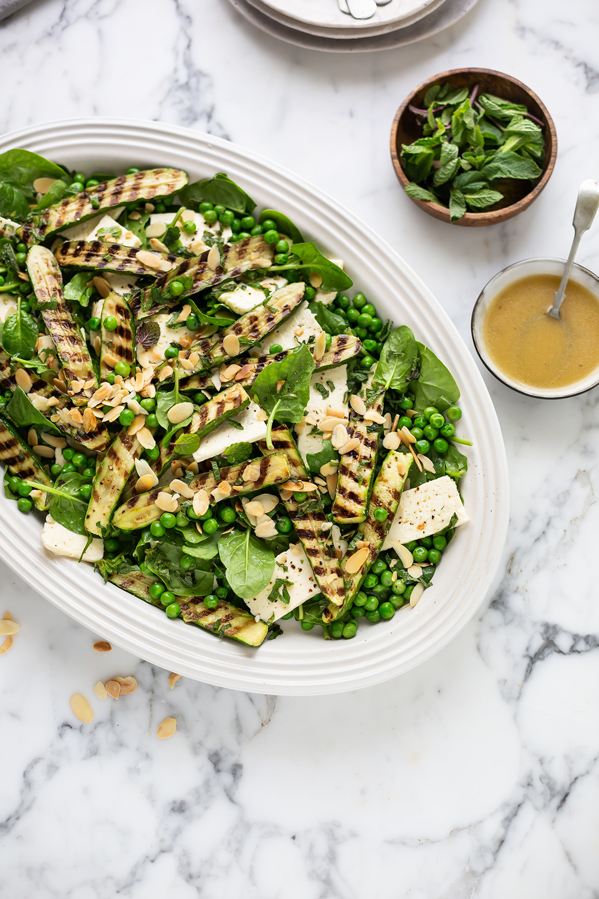 Spinach salad with grilled zucchini, peas, feta & mint recipe