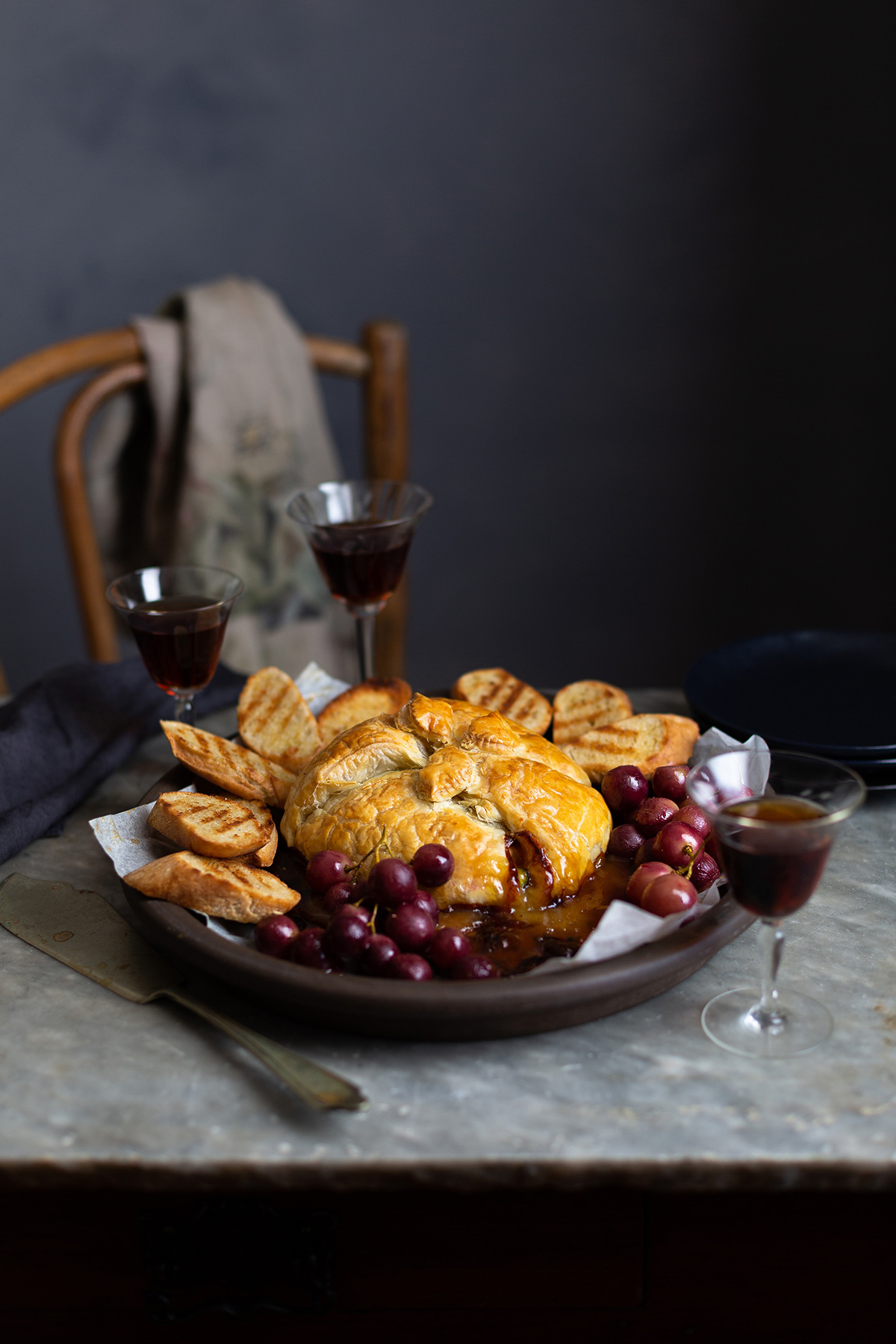 Camembert baked in puff pastry with raisins