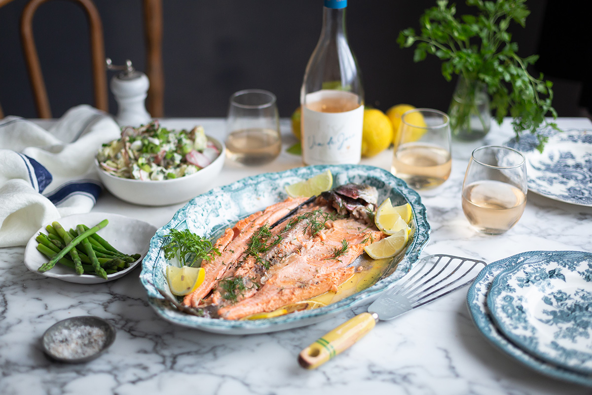 A platter with butterflied baked trout