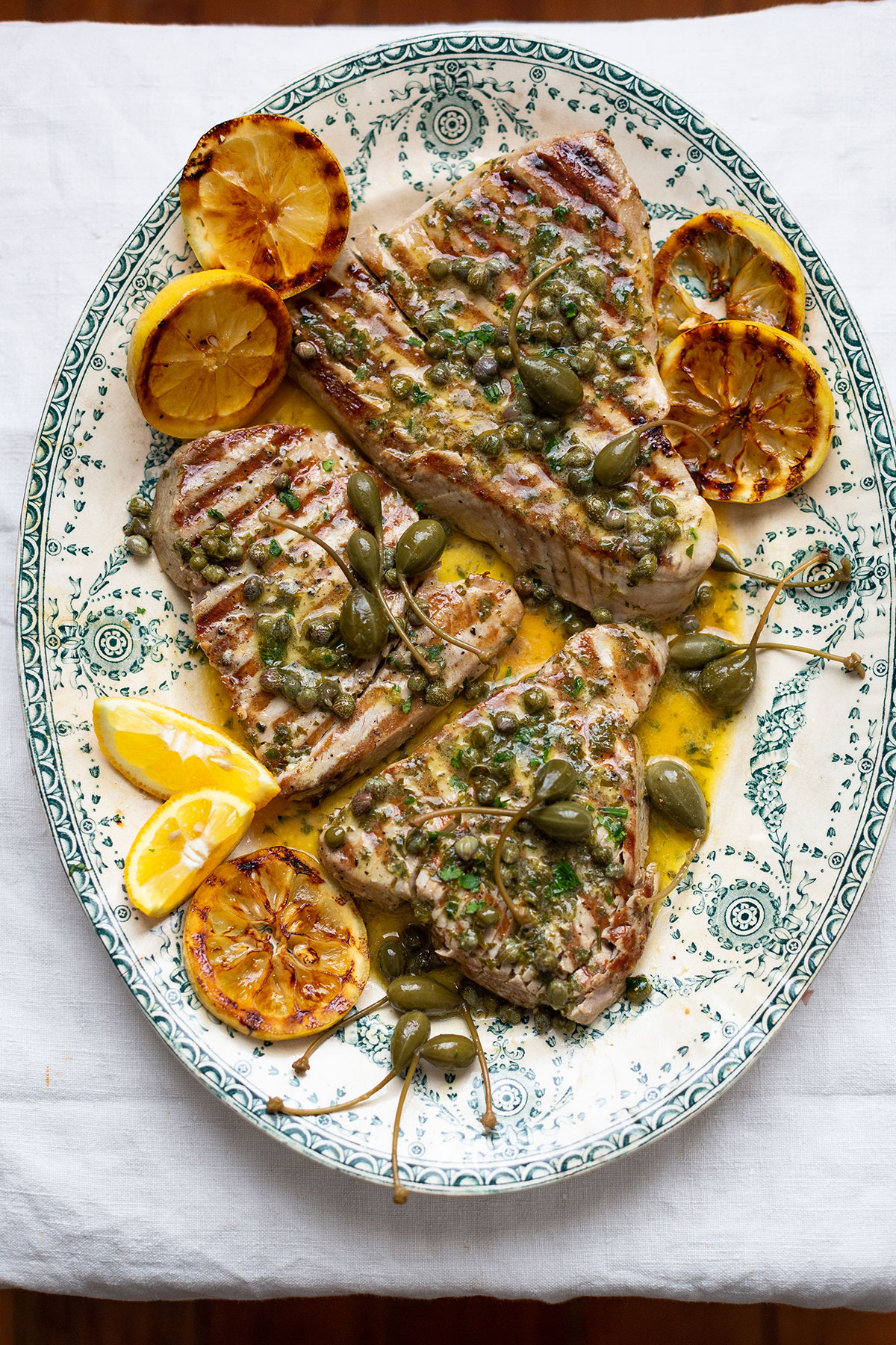 Seared tuna steaks with lemon, caper & parsley butter
