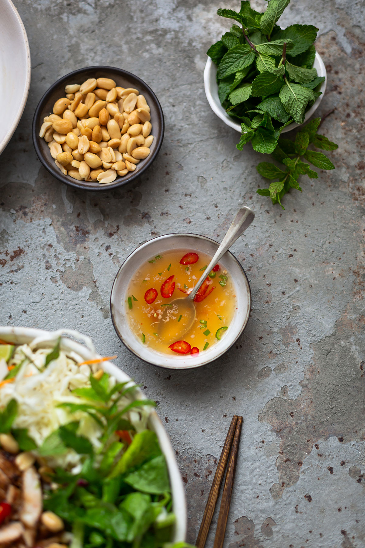 Nuoc cham dressing with sliced red chillies for a Vietnamese rice noodle salad with grilled chicken recipe