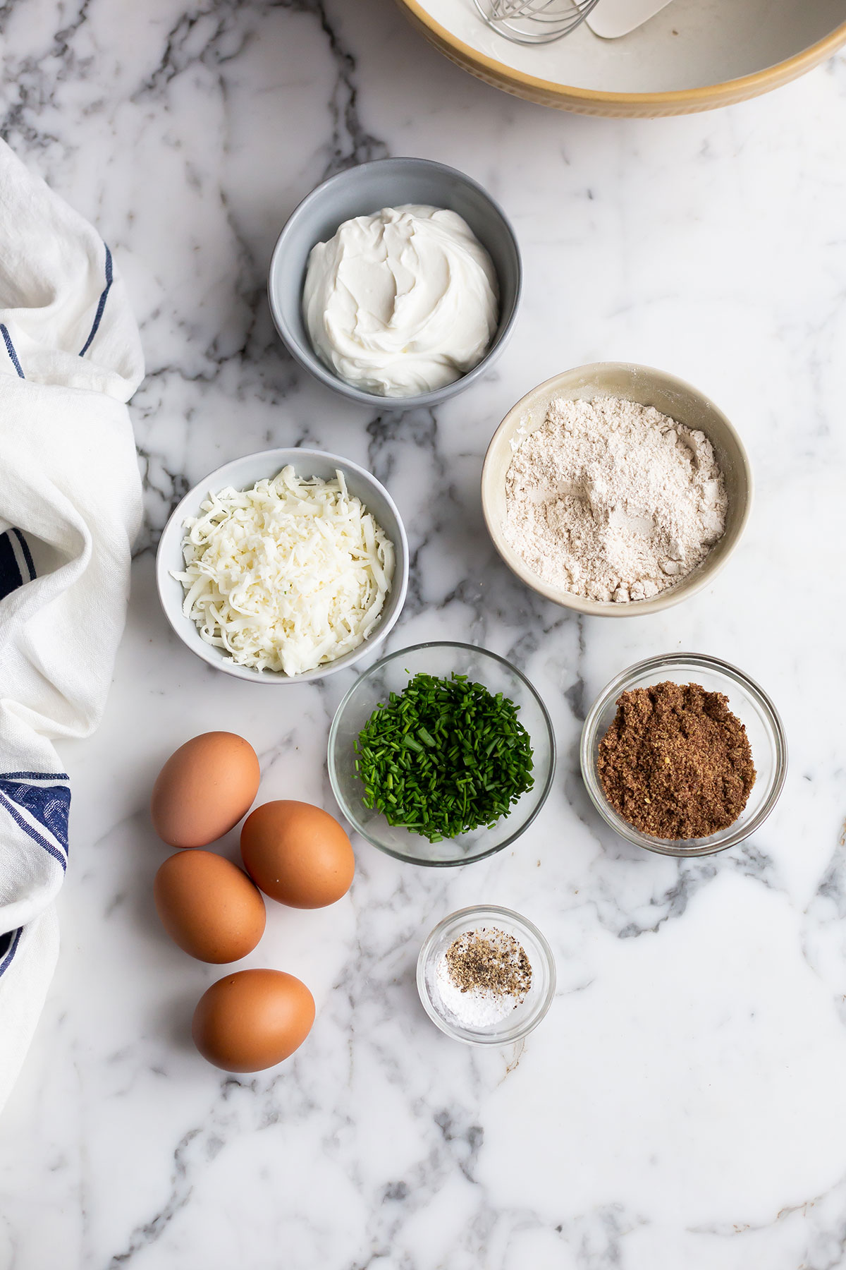 Ingredients to make easy & Healthy high protein cottage cheese waffles laid out on a table