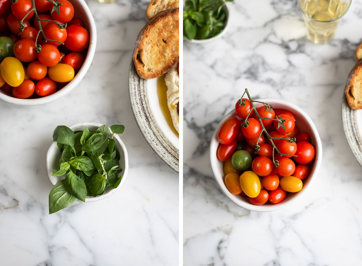 A bowl of tomatoes and basil for a whipped feta with roasted tomatoes and garlic recipe