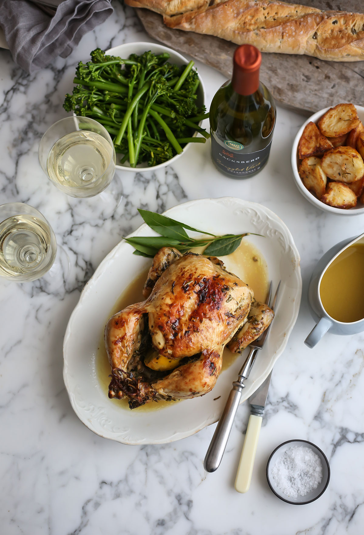 The best juicy roast chicken with wine, herbs and garlic recipe