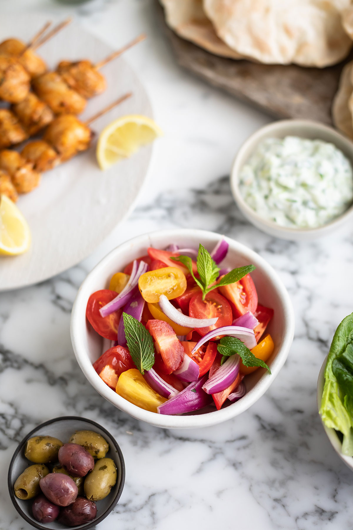 A simple salad for Greek chicken kebabs in an Air fryer recipe